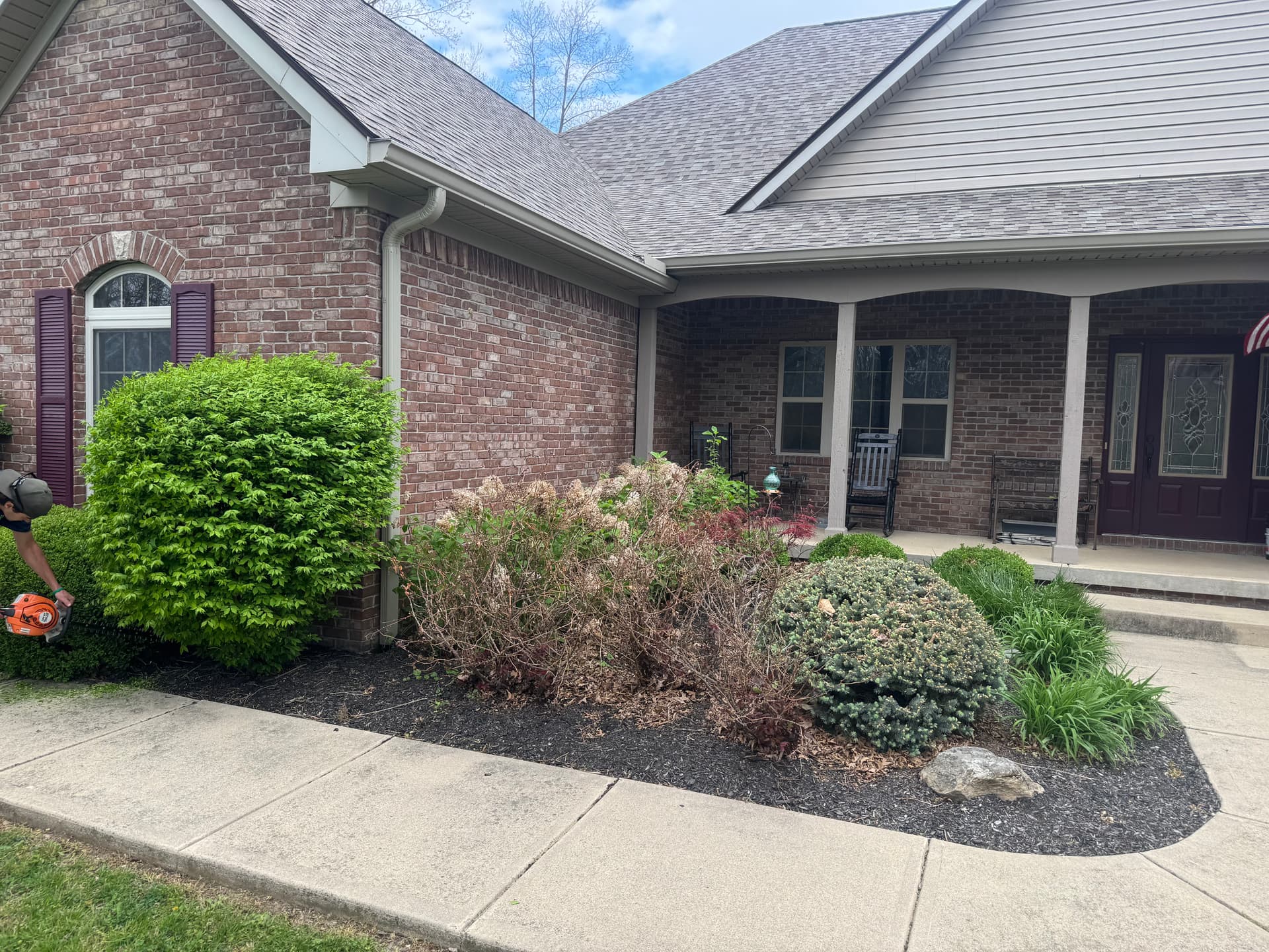 Full Yard Cleanup With Fresh Mulch and Paver Repairs image