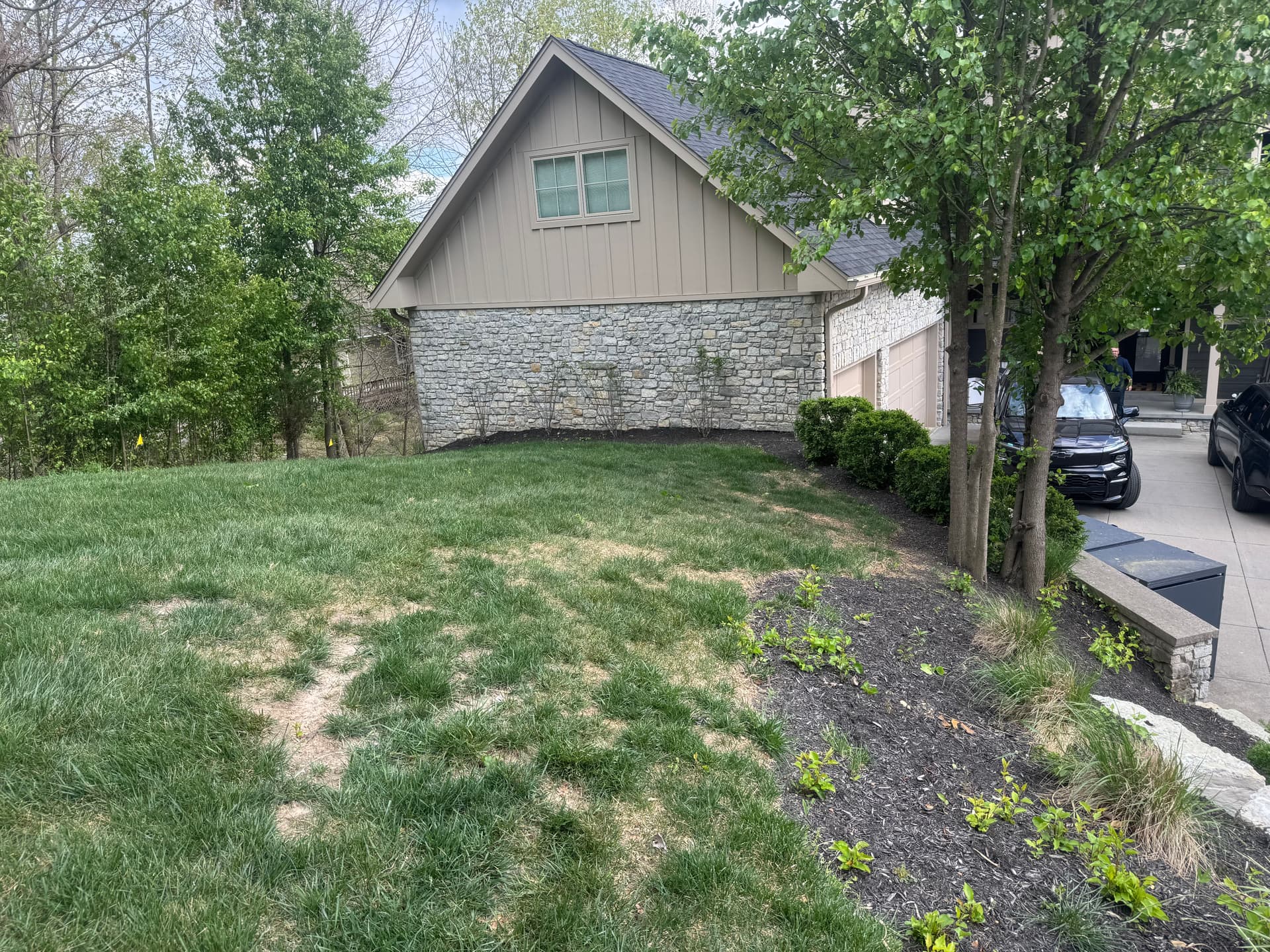 Complete Lakefront Landscape Overhaul with Shrubs, Mulch and Stone image