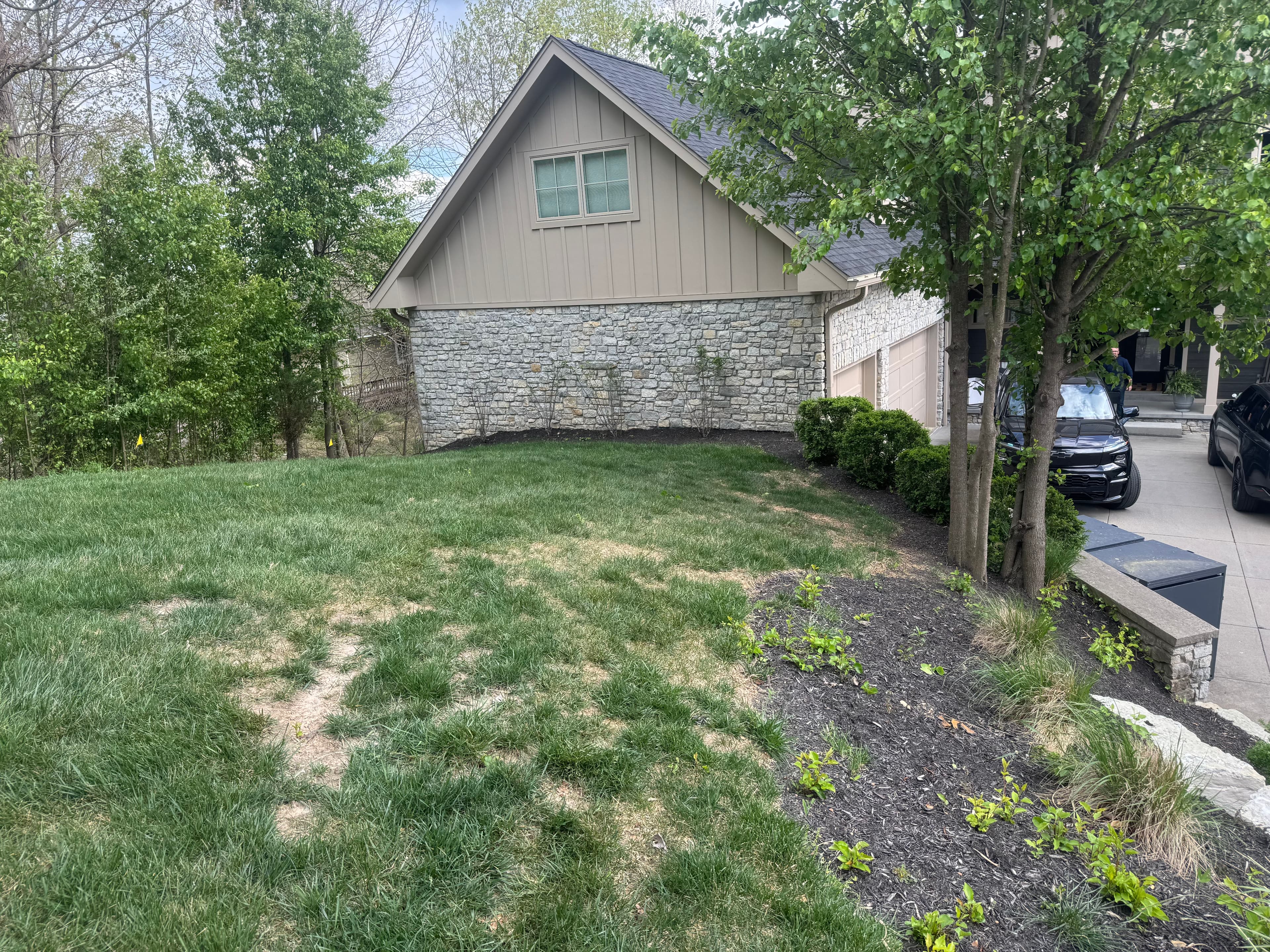 Project Complete Lakefront Landscape Overhaul with Shrubs, Mulch and Stone image